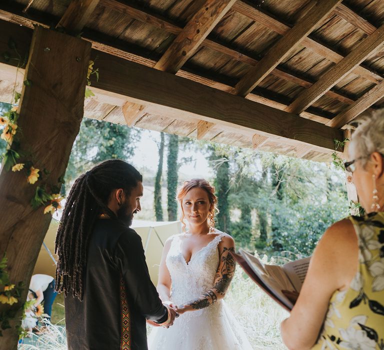 Deer's Leap Retreat Devonshire wedding ceremony with bride in lace wedding dress