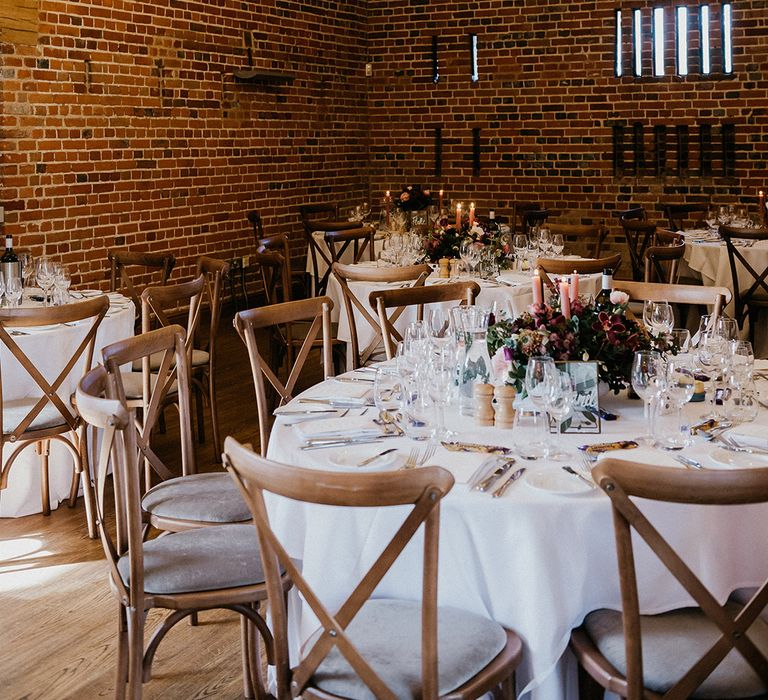 Rustic Wasing Park wedding venue decorated with fairy lights and round tables