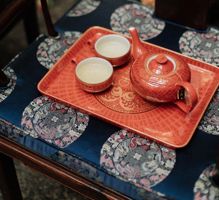 Deep red wedding tea pot and tea cups for the Chinese wedding tea ceremony 