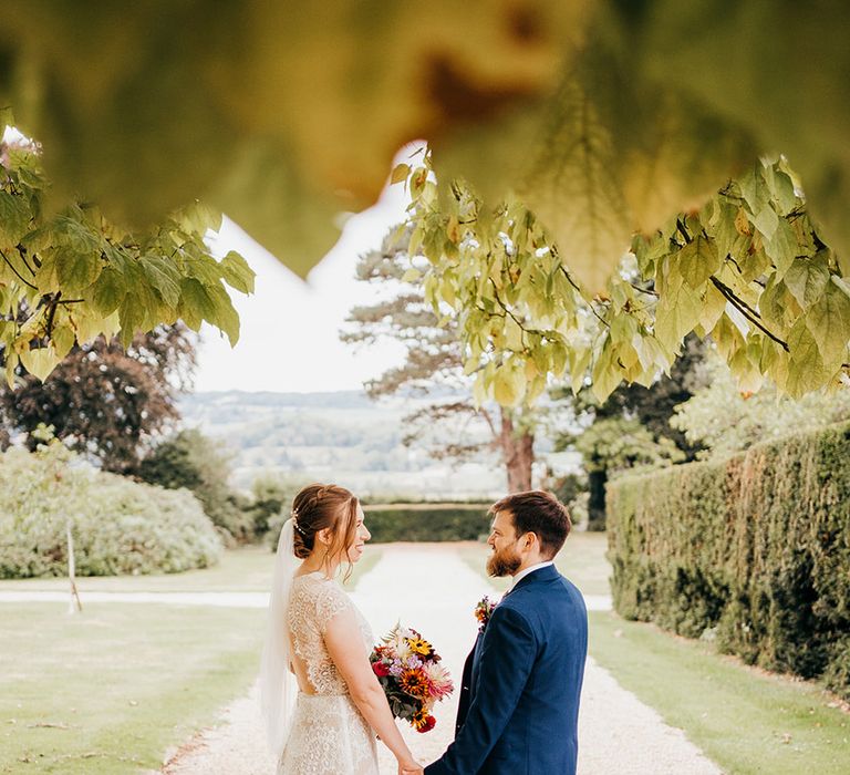 Coombe Lodge couple portrait of bride and groom in the grounds of their Bristol wedding venue 