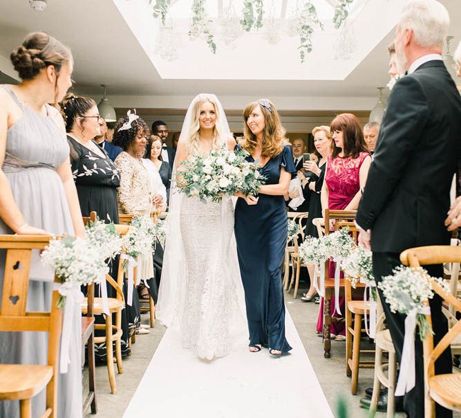 Wedding ceremony bridal entrance with mother of the bride 