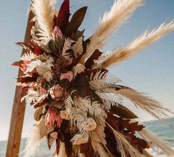 Pampas grass decor for triangle beach alter construction