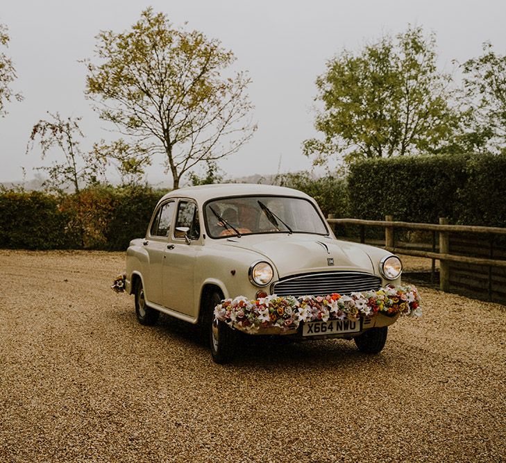 Kushi Cars wedding transport with floral bumper decoration