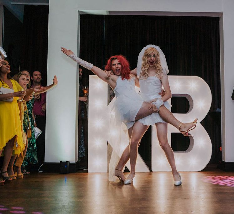 Grooms dance in drag on their wedding day | Kim Williams Weddings