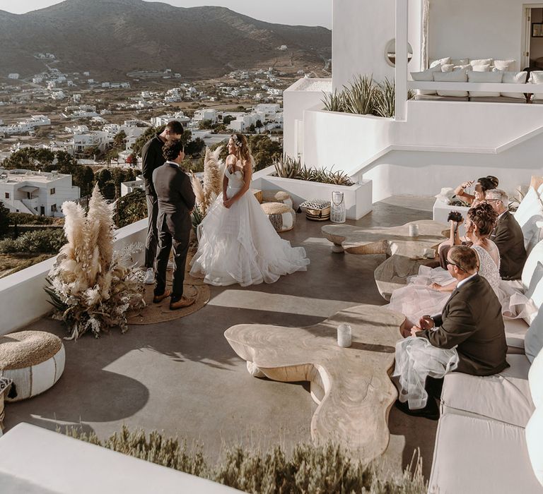 Bride & groom outdoors on their wedding day during intimate ceremony