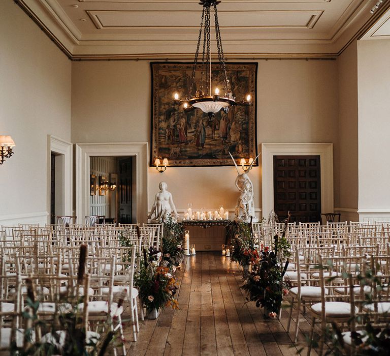 Elmore Court country house wedding venue with wooden floors, white statues and stained glass windows