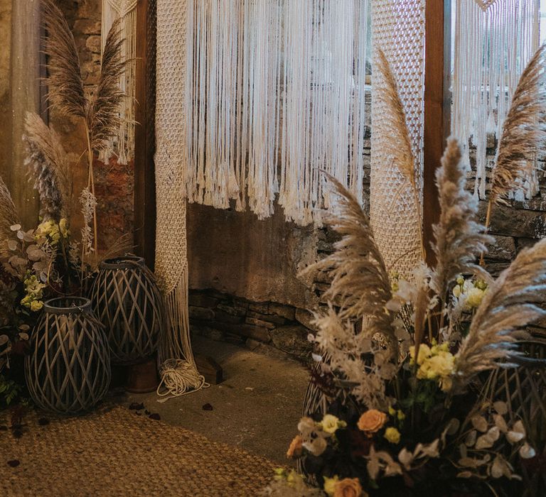 Boho macrame altar style wedding decor for rustic wedding at Ash Barton Estate