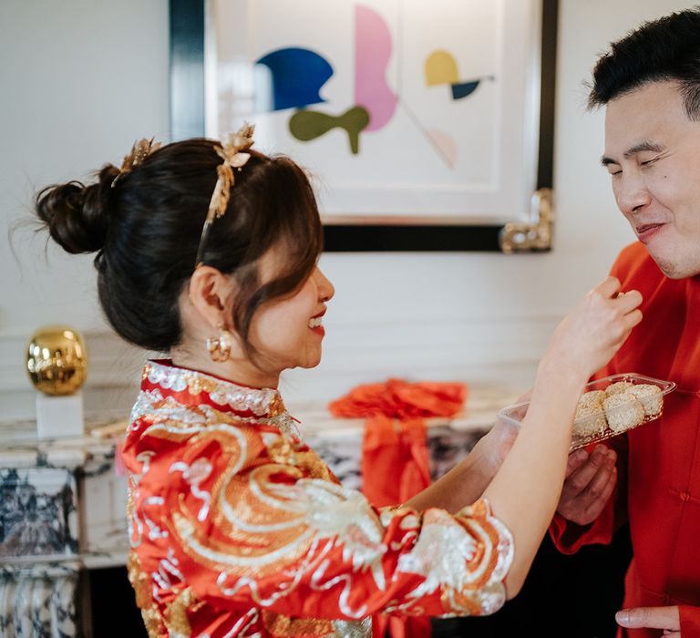 Bride & groom during Chinese tea ceremony at The Dorchester with friends & family