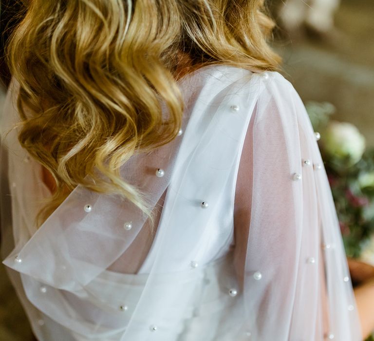 Pearl embellished wedding cape 