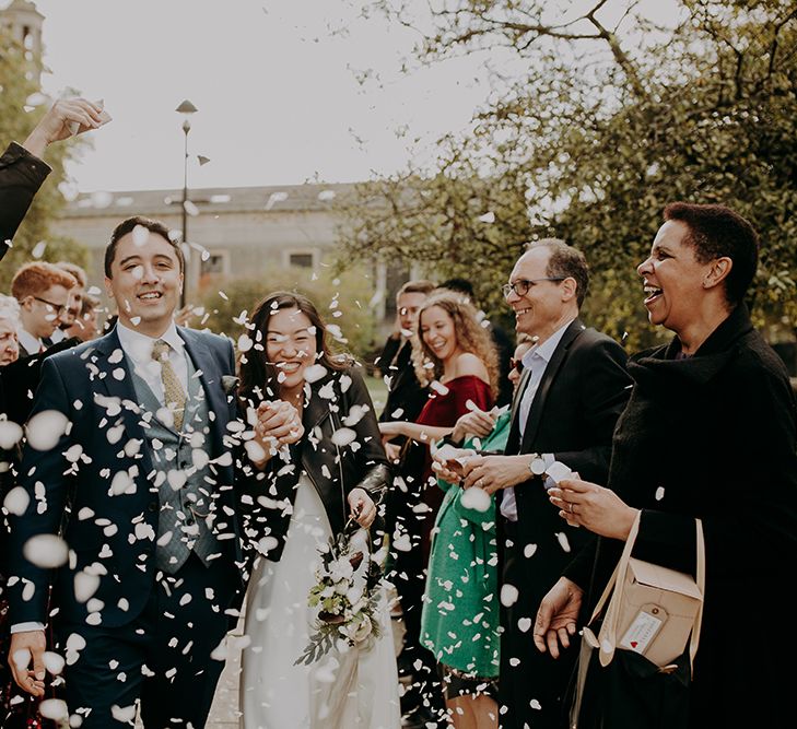 Confetti moment by Irene Yap Wedding Photography