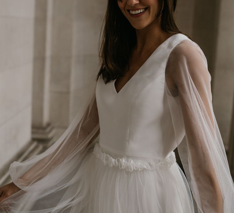 Sheer long sleeves and ruffled waist detail by Story Of My Dress 