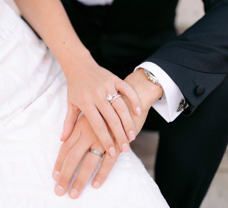 Close up shot of newly wed couple's wedding rings