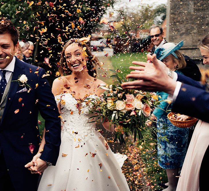 Confetti moment at barn wedding venue 