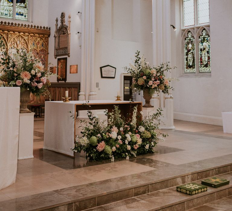 Stunning London church wedding with pastel pink rose bouquets 