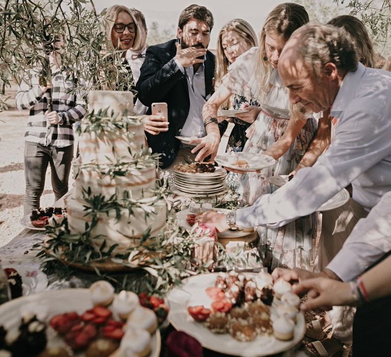 Guests enjoying buffet wedding food