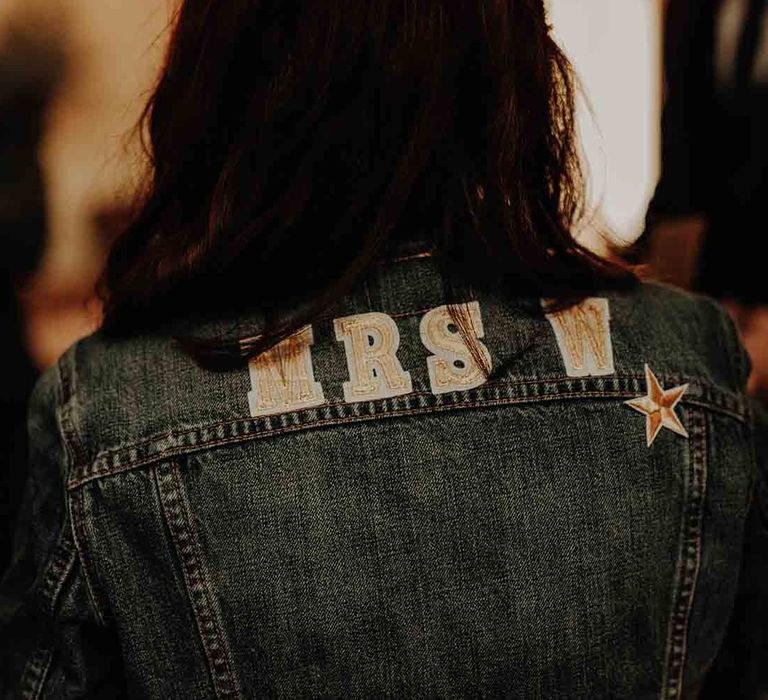 Personalised denim jacket for newlywed bride