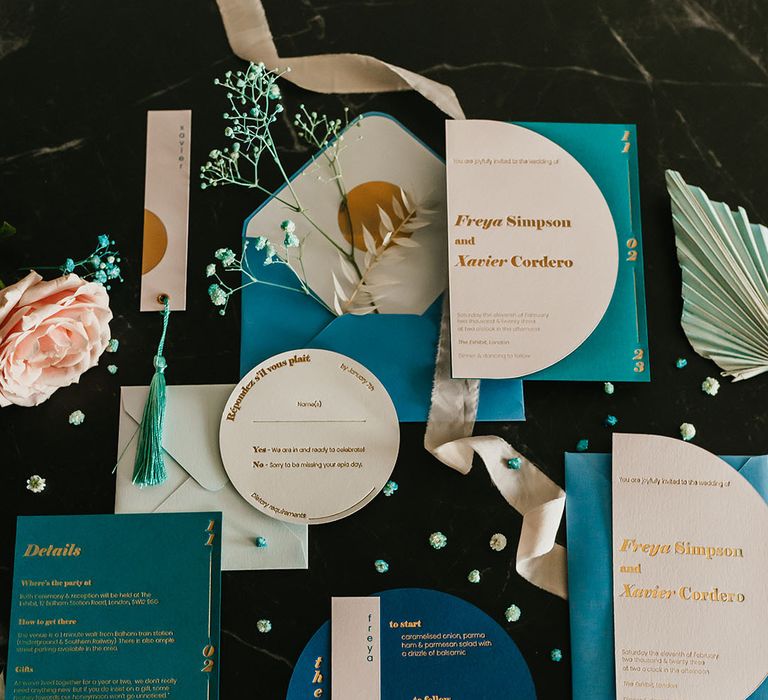 teal wedding stationery suite with gold foil font 