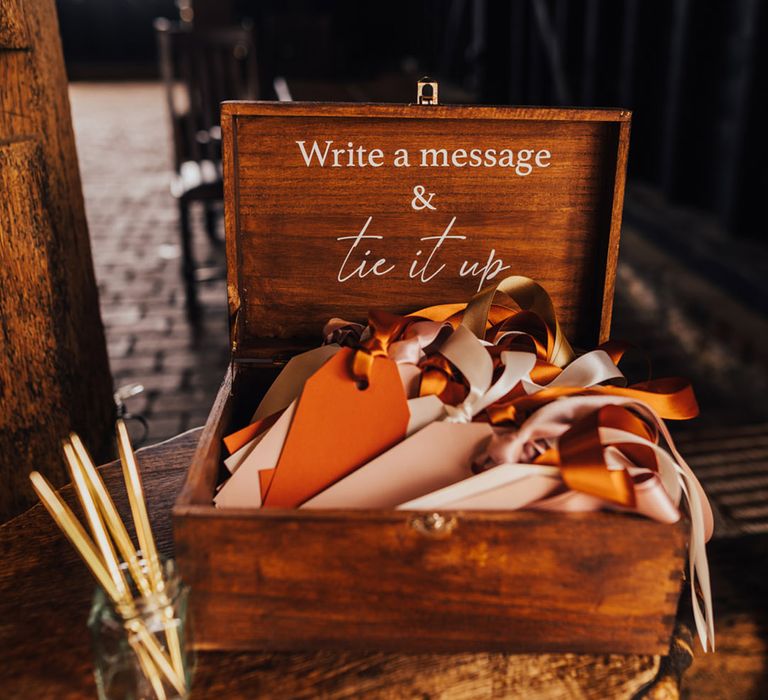 Wedding favours in wooden box with silk ribbons 