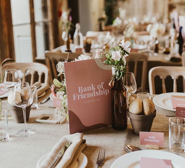 Rustic tablescape complete with pink stationery 