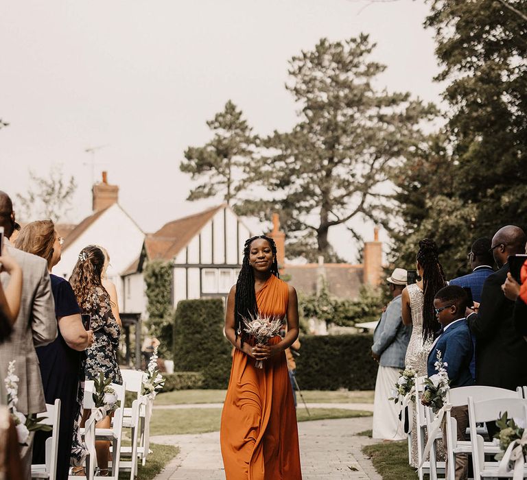 Orange bridesmaids gown for rustic wedding 