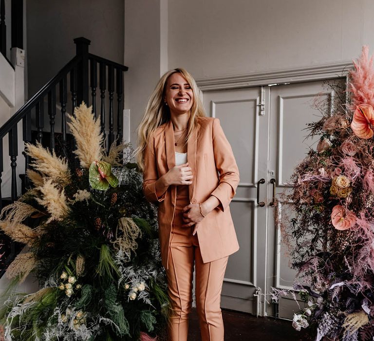 Speeches with peach bridesmaid suits 