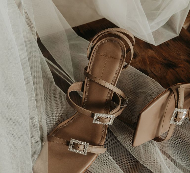 Brown strappy bridal heels complete with embellishment 