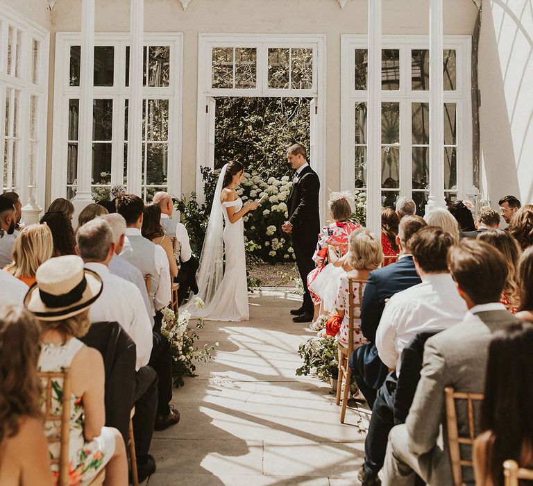 Came House Orangery in Dorset wedding venue with white wedding flower decorations | Steph Newton Photography