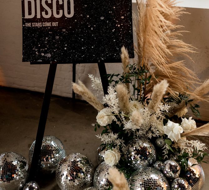 Wedding sign with pampas grass and disco ball wedding decor