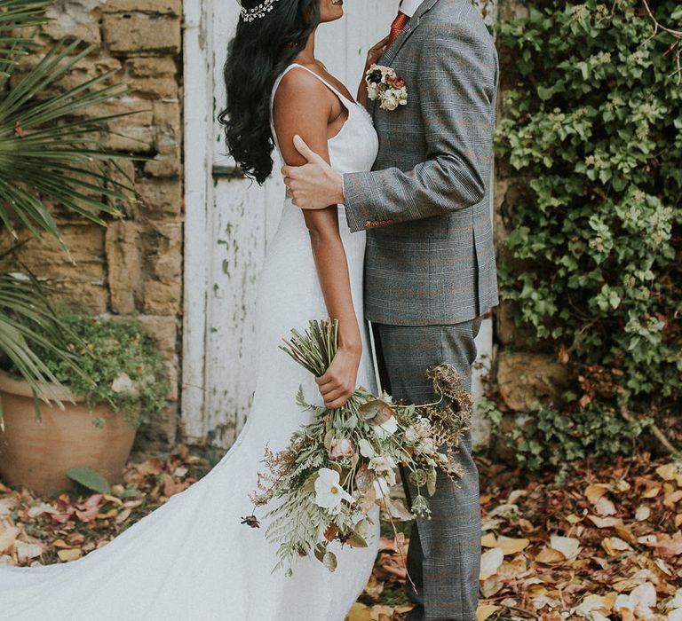 Bride and groom portrait at Hooton Pagnell Hall in Autumn 