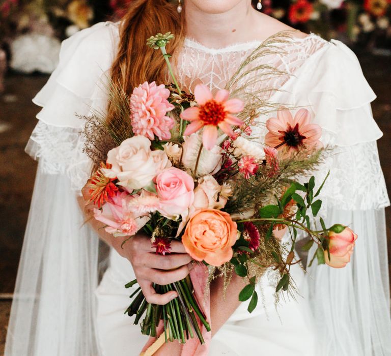 peach and coral wedding bouquet flowers 