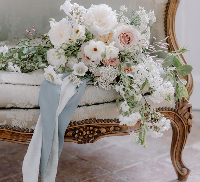 Romantic pastel pink, white and baby blue flowers for a chic French ceremony