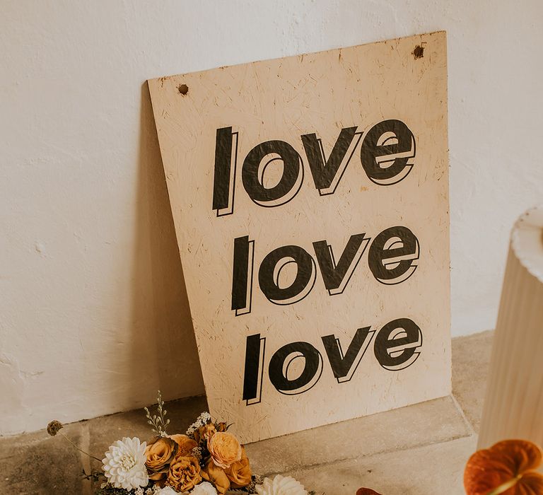 Love, love, love contemporary wedding sign at Curdshall Barns 