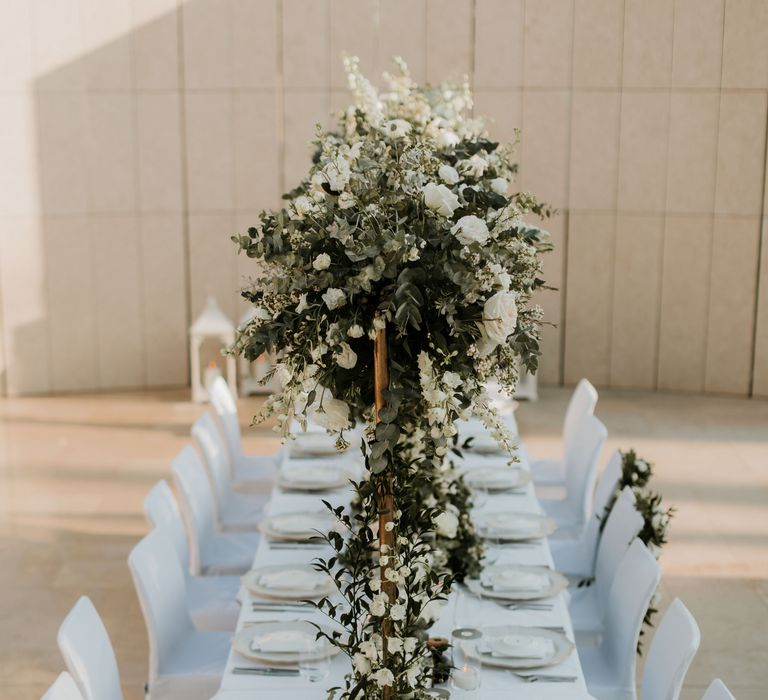 Classic tablescape complete with white table cloth and beautiful floral installations  | Hannah MacGregor Photo & Film