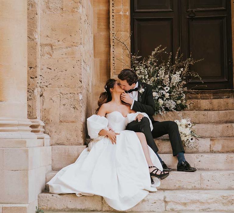 Monochome wedding inspiration at Bodleian Library with bride in a Nortier Shallow wedding dress and black platform shoes 