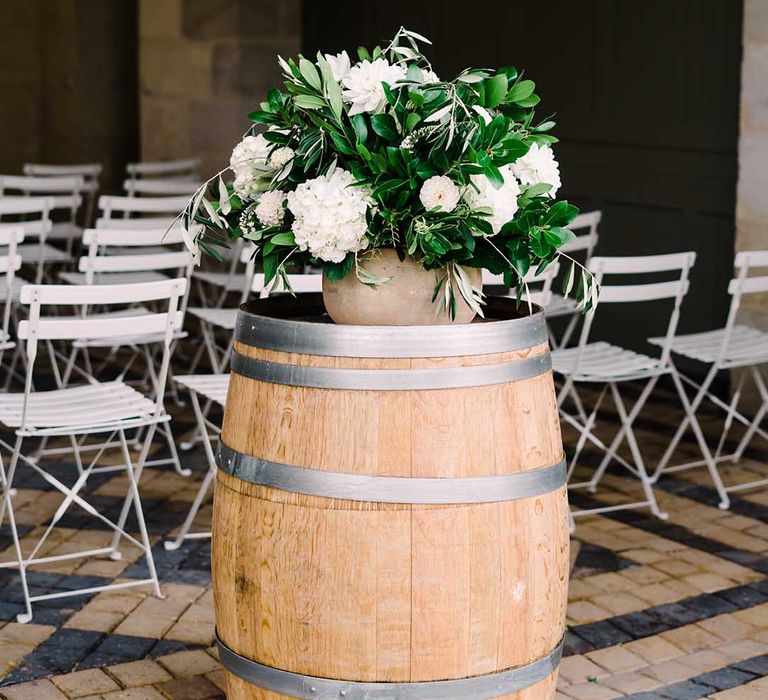 Wooden barrel complete with floral bouquet 