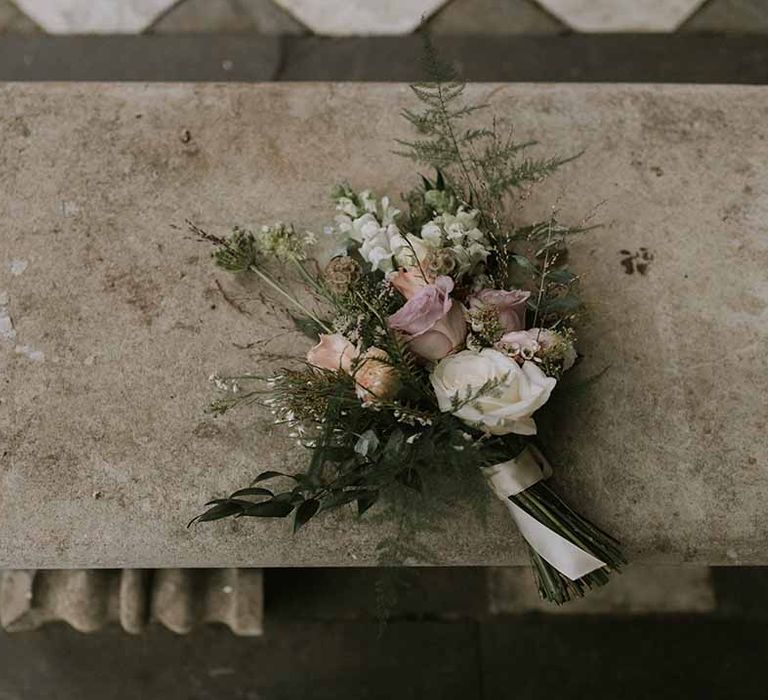 Neutral white, pink and cream bouquet with roses and foliage