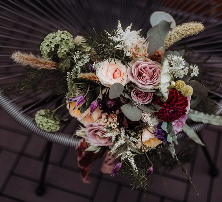 Pink, purple and red wedding flower bouquet 