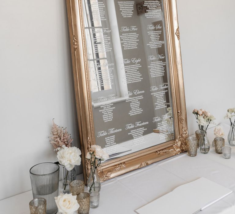 Gold framed mirror Table Plan finished with white writing 