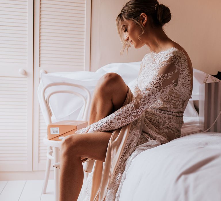 Bride wears white pointed heeled sling back shoes on her wedding day