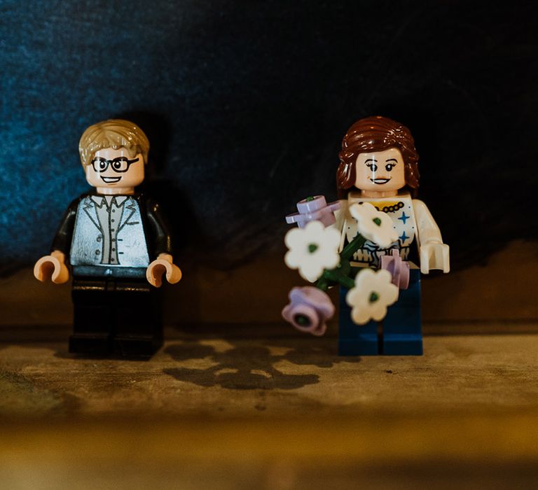 Mini lego figurines made to look like the bride and groom 