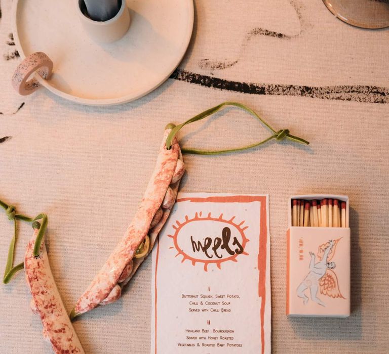 Artsy abstract wedding tablecloth with abstract wedding stationery and wedding decor at Margate Caves