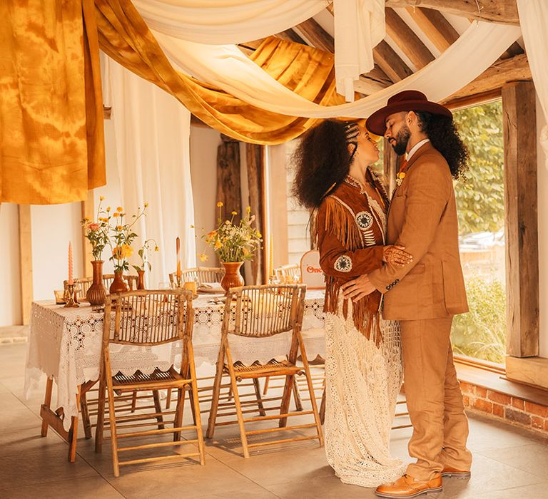 Orange and white wedding drape inspiration decorating The Oak Barn eco friendly wedding venue 