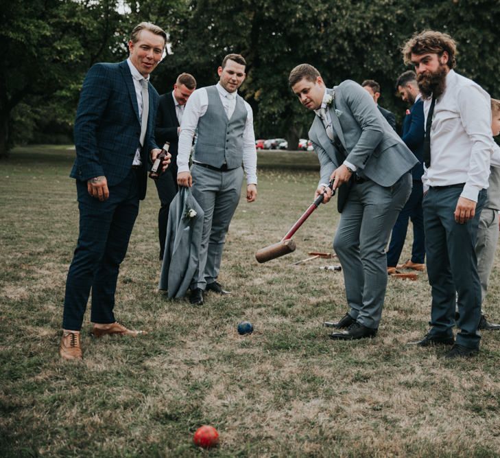 Garden games at Notley Abbey summer wedding 