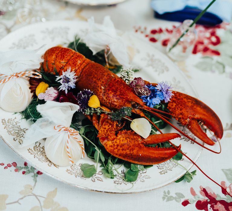 Rose tablecloth with lobster and edible flowers for picnic wedding 