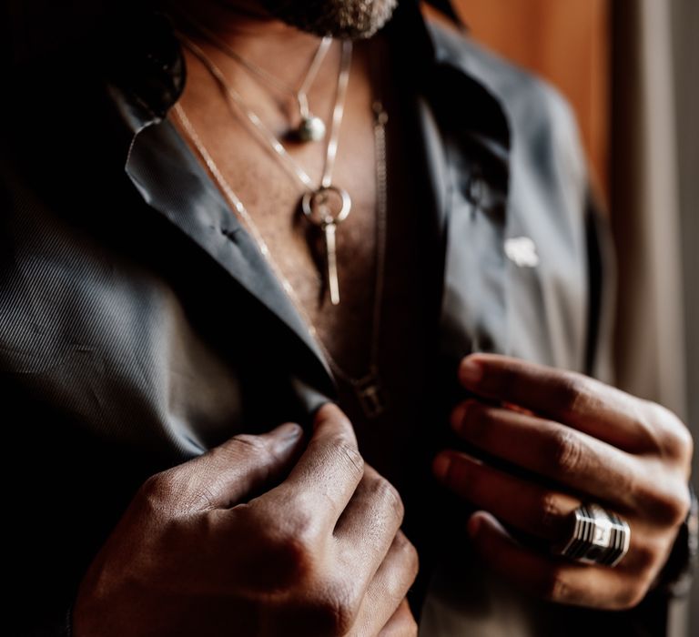 Groom buttons up black shirt 