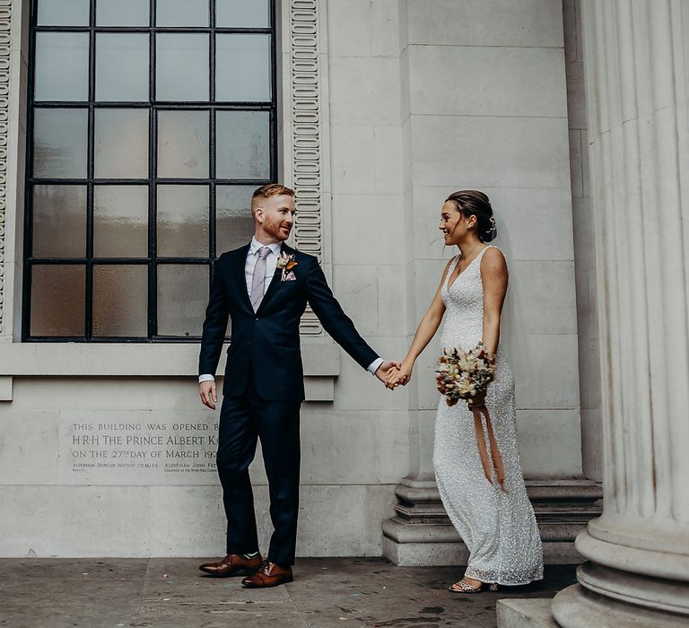 Bride and groom wedding portraits at Town Hall wedding in London 