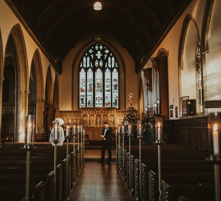 Bride & groom during ceremony at the Sherborne School 