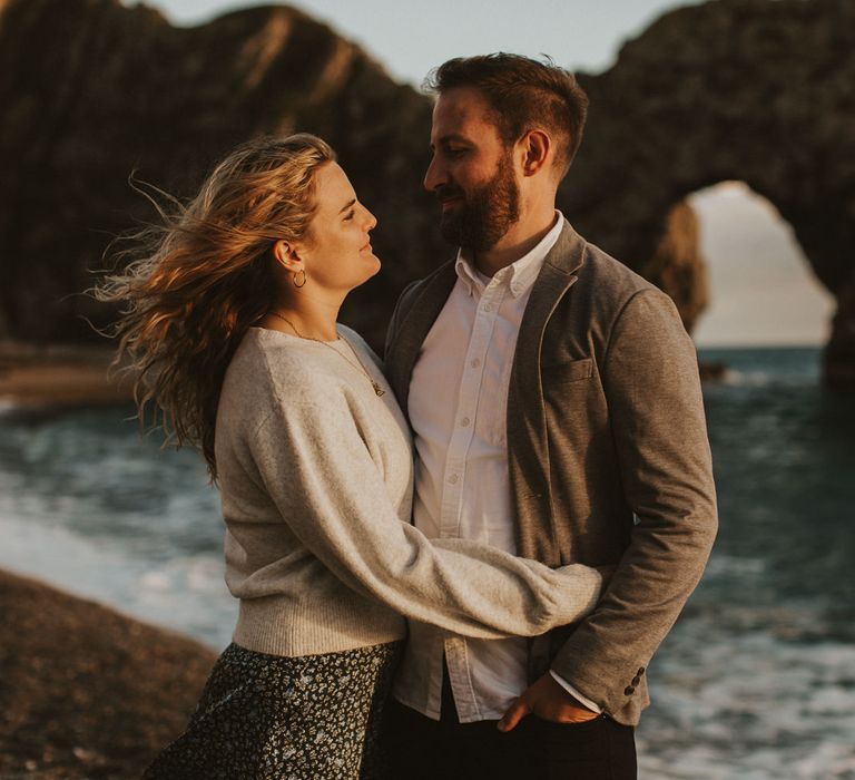 Bride and groom at Durdle Door Beach engagement shoot 