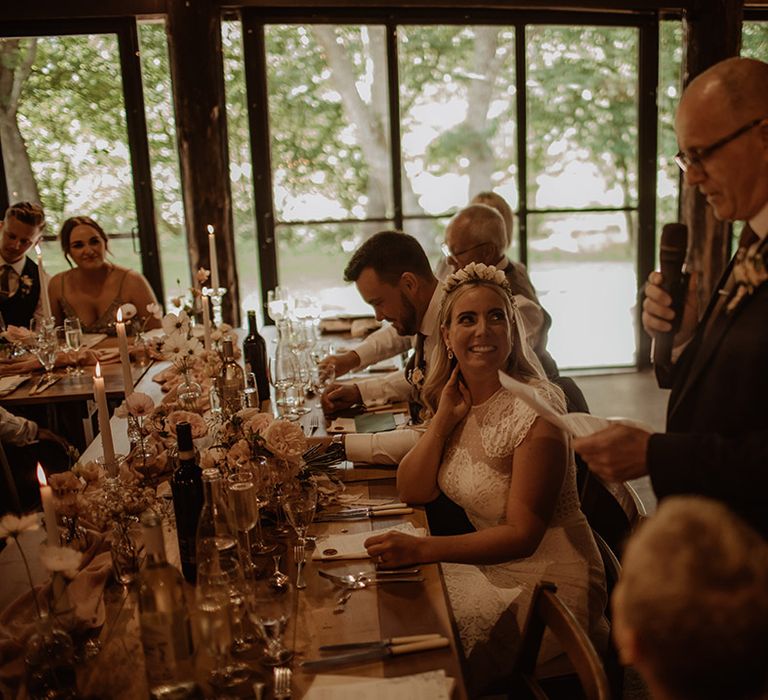 Father of the bride wedding speech at Summer Dewsall Court wedding with floral arch 