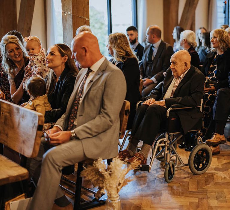 Wedding guests at barn civil ceremony 